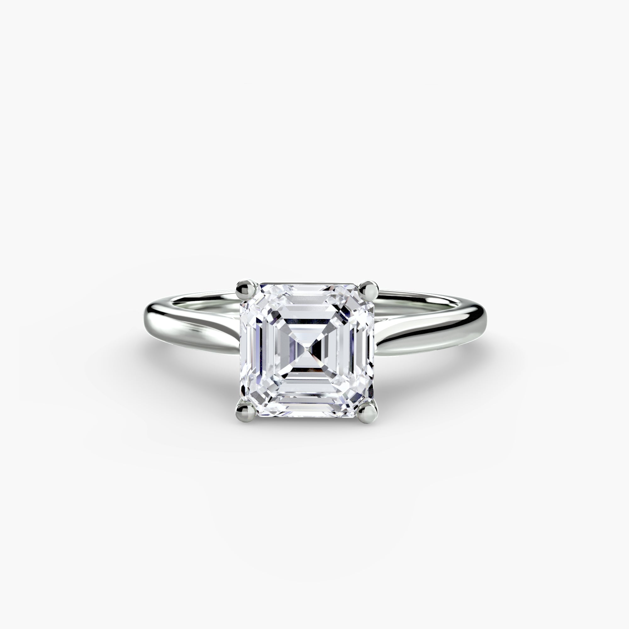 Diamond ring with a square-cut gemstone on a white background