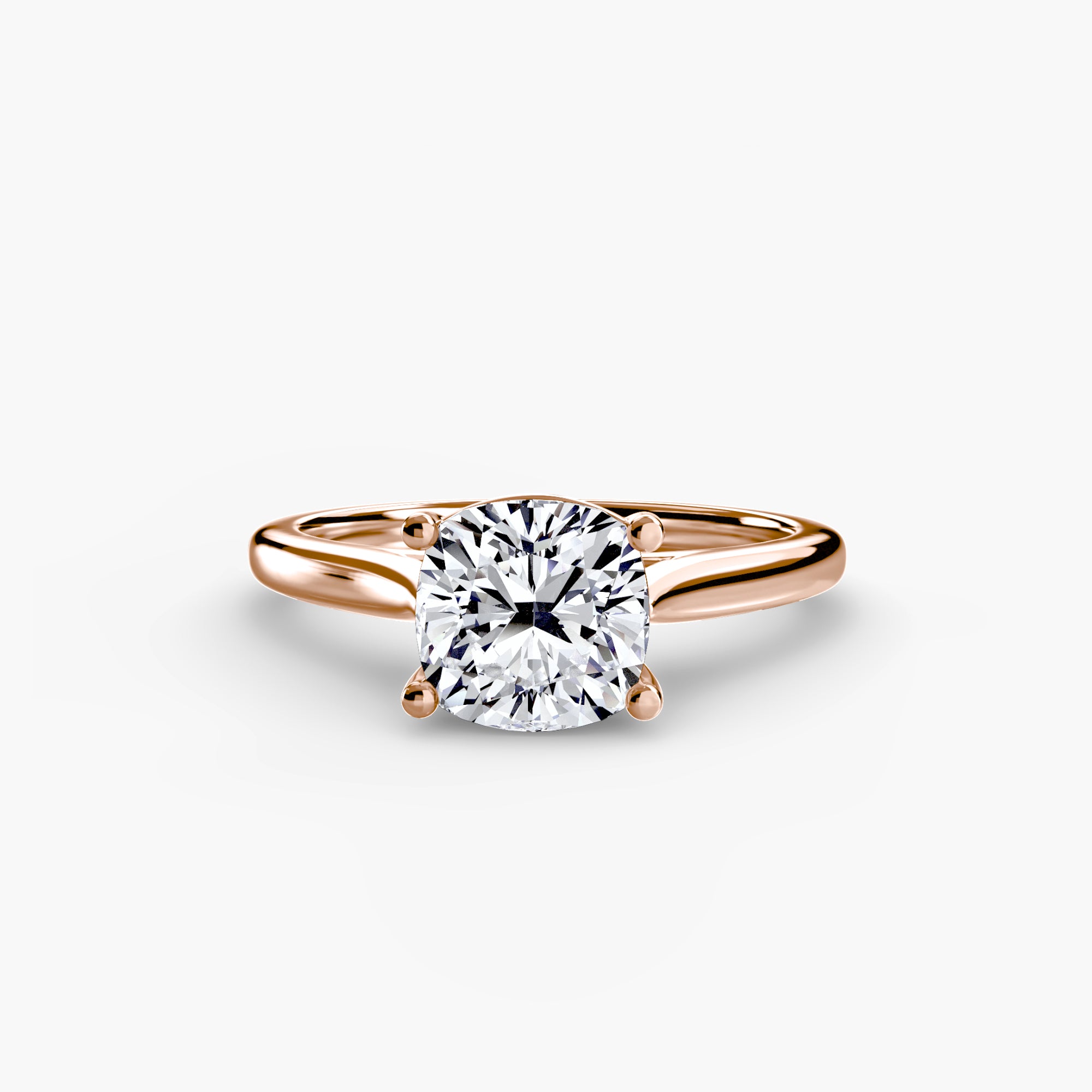 Rose gold ring with a large diamond on a white background