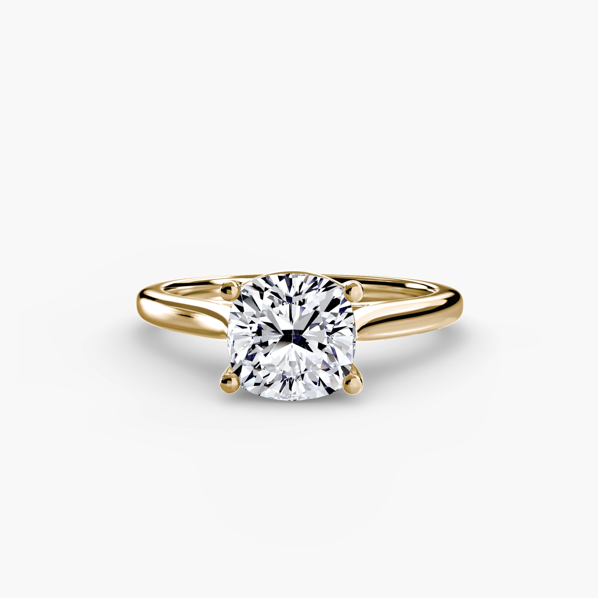 Gold ring with a large diamond on a white background