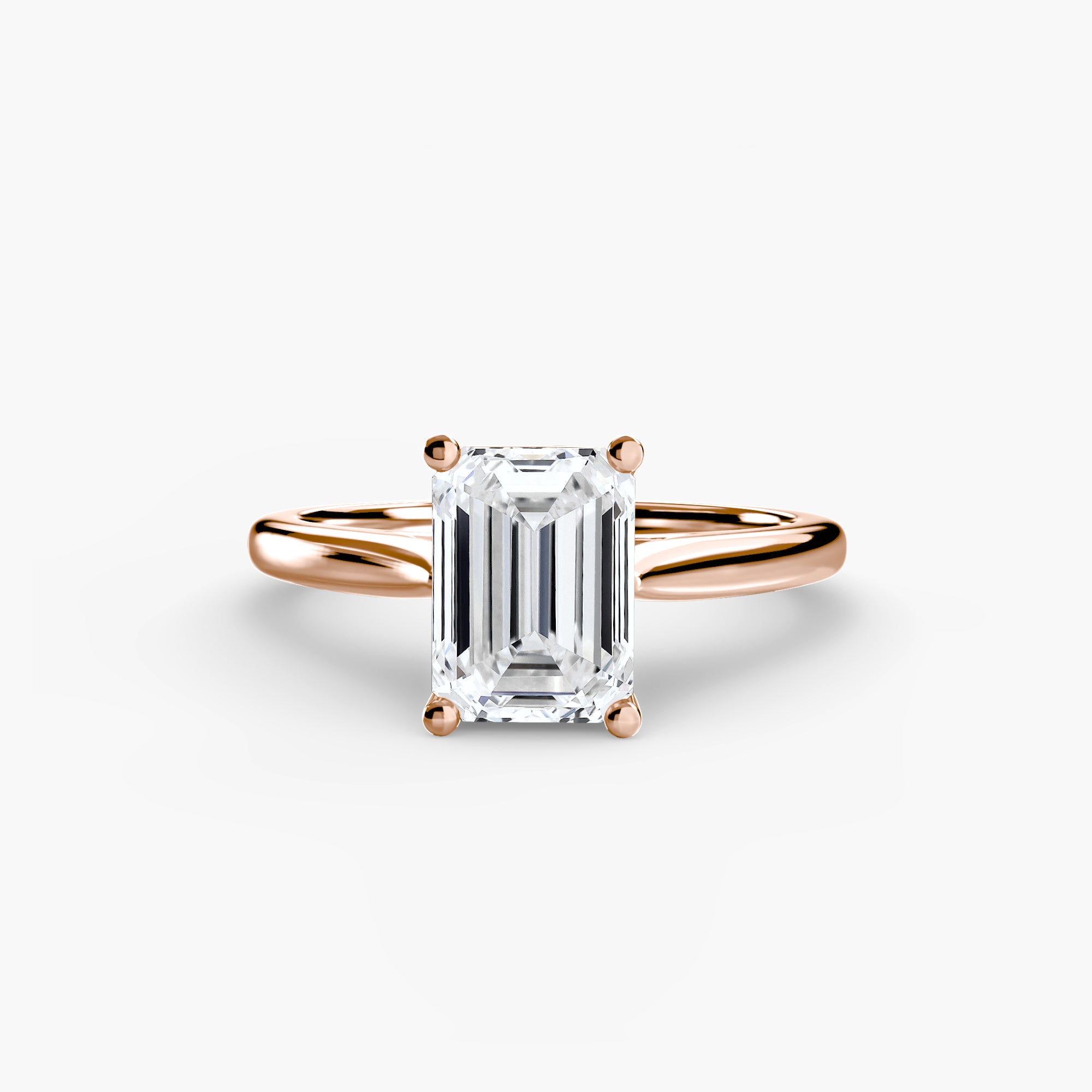 Rose gold ring with a large diamond on a white background