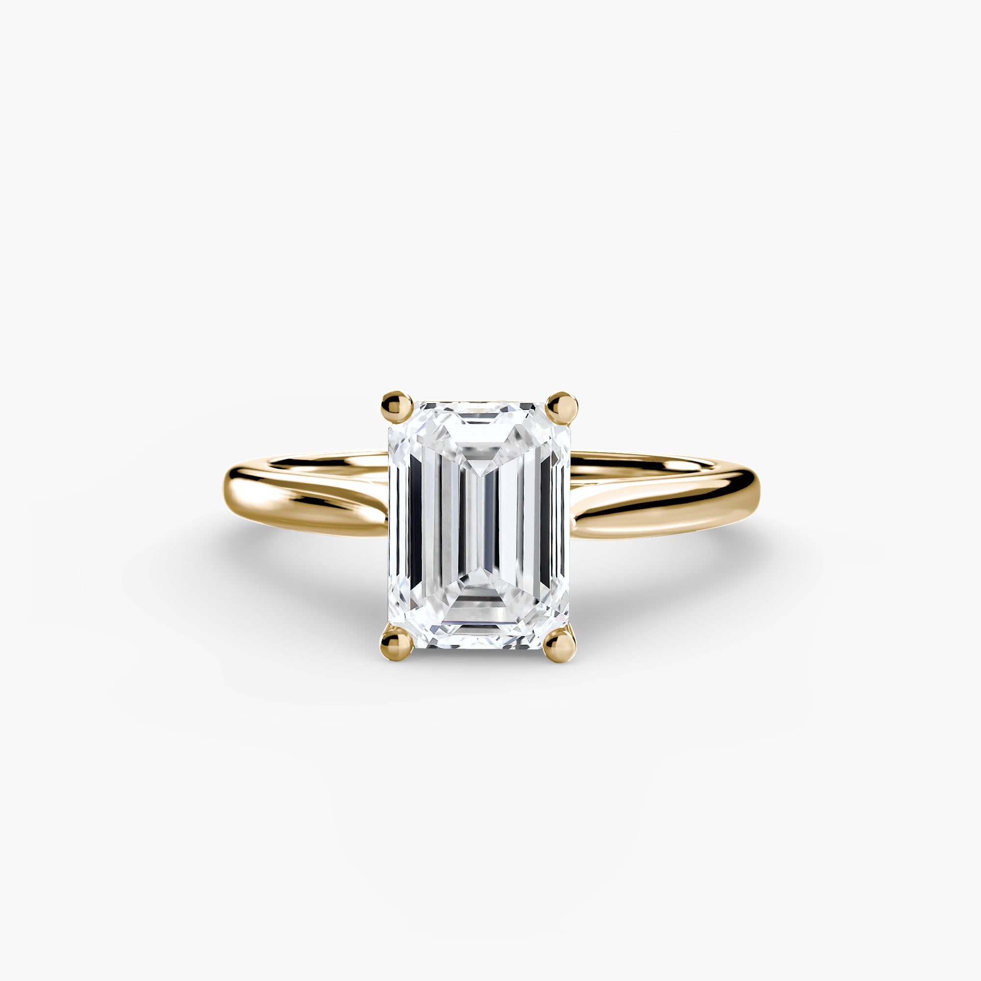 Gold ring with a rectangular diamond