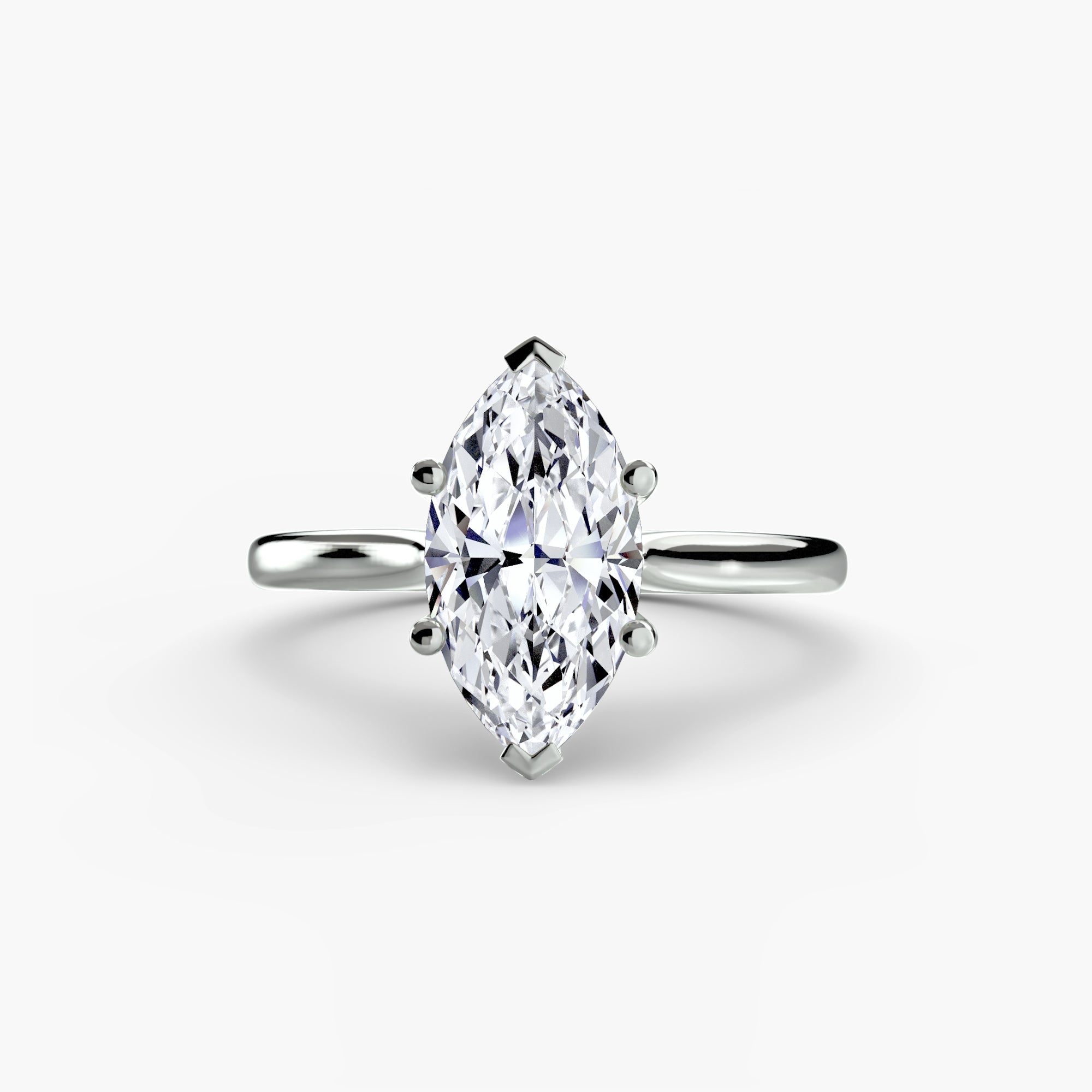 Diamond ring with a marquise-shaped gemstone on a white background